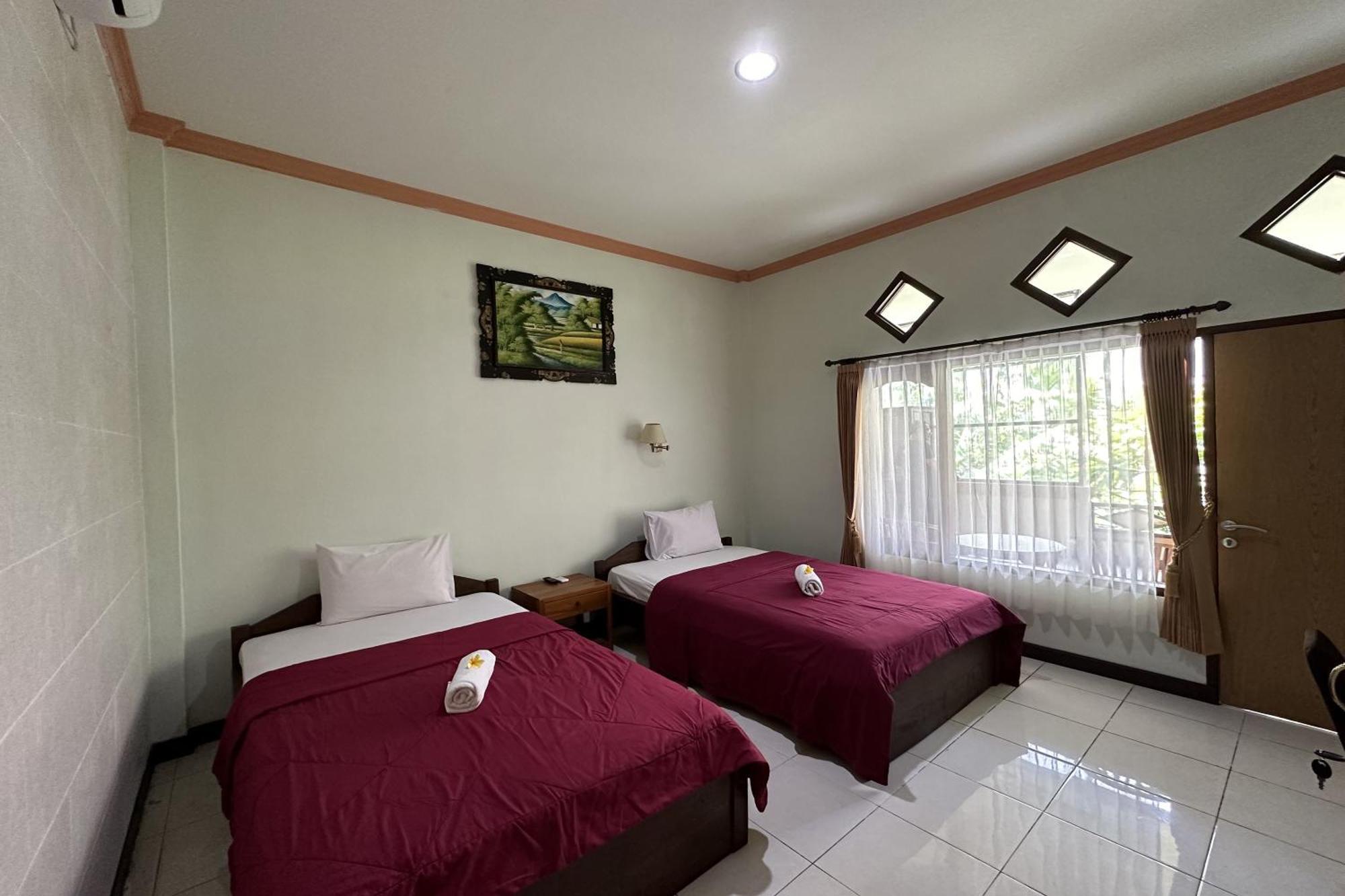 Taxa Raya Guest House Легиан Экстерьер фото